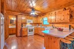 Fully Equipped Kitchen Features Gas Stove and Ample Counter Space